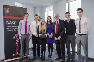 Nick Lambert, Head Judge, mentor Hayley Lewis and the winning team from King Edward VI School